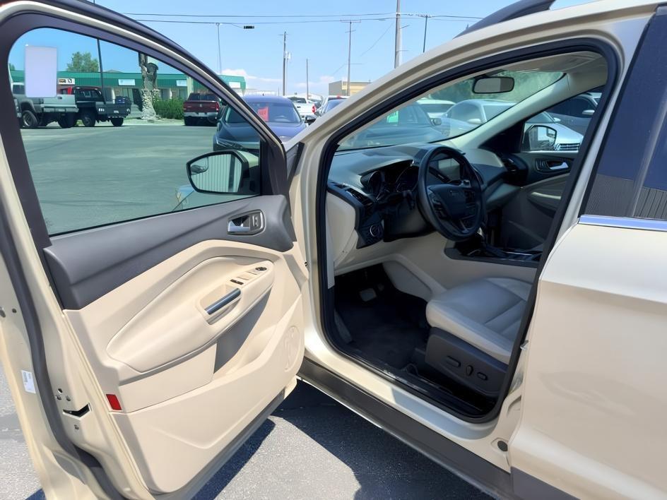 2018 GOLD /Medium Light Stone Ford Escape (1FMCU9HD3JU) with an EcoBoost 15L I-4 gasoline direct injection engine, Automatic transmission, located at 1175 N Woodruff Ave, Idaho Falls, ID, 83401, 43.506901, -111.999657- Photo#11