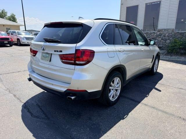 2014 SILVER /Black BMW X5 xDrive35i (5UXKR0C57E0) with an 3L I-6 gasoline direct injection engine, AUTOMATIC transmission, located at 1235 N Woodruff Ave., Idaho Falls, 83401, (208) 523-1053, 43.507172, -112.000488 - This 2014 BMW X5 delivers a smooth turbocharged inline-6 paired with BMW's xDrive AWD system for confident everyday driving and highway comfort. The cabin offers a premium feel with seating for five and flexible cargo space for daily use, travel, or errands. It balances luxury and practicality in a- Photo#35