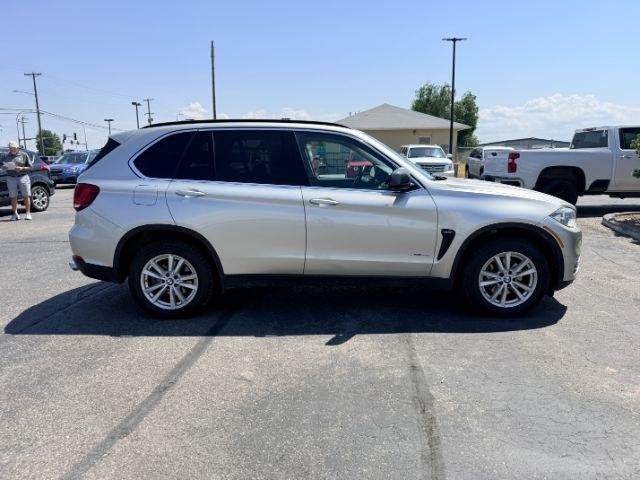 2014 SILVER /Black BMW X5 xDrive35i (5UXKR0C57E0) with an 3L I-6 gasoline direct injection engine, AUTOMATIC transmission, located at 1235 N Woodruff Ave., Idaho Falls, 83401, (208) 523-1053, 43.507172, -112.000488 - This 2014 BMW X5 delivers a smooth turbocharged inline-6 paired with BMW's xDrive AWD system for confident everyday driving and highway comfort. The cabin offers a premium feel with seating for five and flexible cargo space for daily use, travel, or errands. It balances luxury and practicality in a- Photo#36