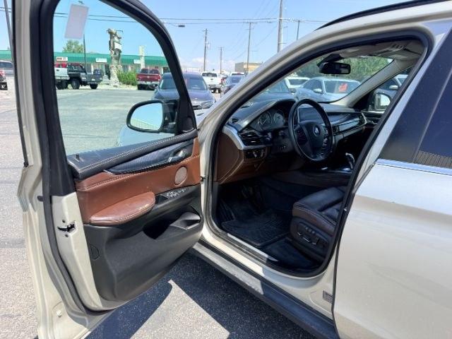 2014 SILVER /Black BMW X5 xDrive35i (5UXKR0C57E0) with an 3L I-6 gasoline direct injection engine, AUTOMATIC transmission, located at 1235 N Woodruff Ave., Idaho Falls, 83401, (208) 523-1053, 43.507172, -112.000488 - This 2014 BMW X5 delivers a smooth turbocharged inline-6 paired with BMW's xDrive AWD system for confident everyday driving and highway comfort. The cabin offers a premium feel with seating for five and flexible cargo space for daily use, travel, or errands. It balances luxury and practicality in a- Photo#41