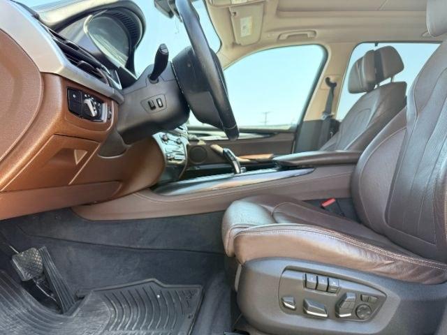 2014 SILVER /Black BMW X5 xDrive35i (5UXKR0C57E0) with an 3L I-6 gasoline direct injection engine, AUTOMATIC transmission, located at 1235 N Woodruff Ave., Idaho Falls, 83401, (208) 523-1053, 43.507172, -112.000488 - This 2014 BMW X5 delivers a smooth turbocharged inline-6 paired with BMW's xDrive AWD system for confident everyday driving and highway comfort. The cabin offers a premium feel with seating for five and flexible cargo space for daily use, travel, or errands. It balances luxury and practicality in a- Photo#42