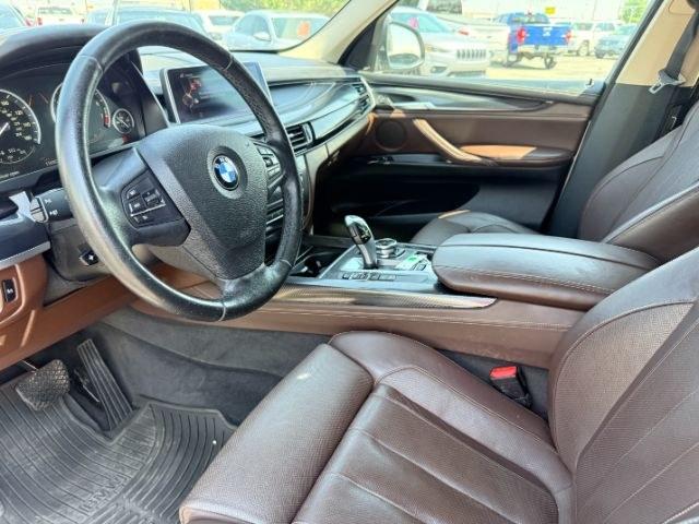 2014 SILVER /Black BMW X5 xDrive35i (5UXKR0C57E0) with an 3L I-6 gasoline direct injection engine, AUTOMATIC transmission, located at 1235 N Woodruff Ave., Idaho Falls, 83401, (208) 523-1053, 43.507172, -112.000488 - This 2014 BMW X5 delivers a smooth turbocharged inline-6 paired with BMW's xDrive AWD system for confident everyday driving and highway comfort. The cabin offers a premium feel with seating for five and flexible cargo space for daily use, travel, or errands. It balances luxury and practicality in a- Photo#43