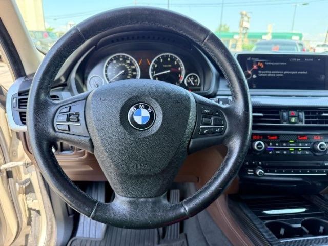 2014 SILVER /Black BMW X5 xDrive35i (5UXKR0C57E0) with an 3L I-6 gasoline direct injection engine, AUTOMATIC transmission, located at 1235 N Woodruff Ave., Idaho Falls, 83401, (208) 523-1053, 43.507172, -112.000488 - This 2014 BMW X5 delivers a smooth turbocharged inline-6 paired with BMW's xDrive AWD system for confident everyday driving and highway comfort. The cabin offers a premium feel with seating for five and flexible cargo space for daily use, travel, or errands. It balances luxury and practicality in a- Photo#44