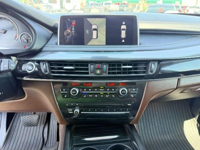 2014 SILVER /Black BMW X5 xDrive35i (5UXKR0C57E0) with an 3L I-6 gasoline direct injection engine, AUTOMATIC transmission, located at 1235 N Woodruff Ave., Idaho Falls, 83401, (208) 523-1053, 43.507172, -112.000488 - This 2014 BMW X5 delivers a smooth turbocharged inline-6 paired with BMW's xDrive AWD system for confident everyday driving and highway comfort. The cabin offers a premium feel with seating for five and flexible cargo space for daily use, travel, or errands. It balances luxury and practicality in a- Photo#45