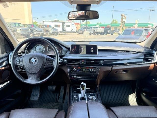 2014 SILVER /Black BMW X5 xDrive35i (5UXKR0C57E0) with an 3L I-6 gasoline direct injection engine, AUTOMATIC transmission, located at 1235 N Woodruff Ave., Idaho Falls, 83401, (208) 523-1053, 43.507172, -112.000488 - This 2014 BMW X5 delivers a smooth turbocharged inline-6 paired with BMW's xDrive AWD system for confident everyday driving and highway comfort. The cabin offers a premium feel with seating for five and flexible cargo space for daily use, travel, or errands. It balances luxury and practicality in a- Photo#52