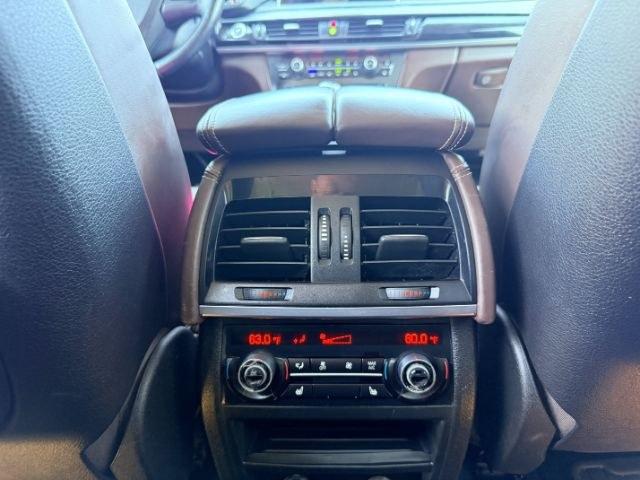 2014 SILVER /Black BMW X5 xDrive35i (5UXKR0C57E0) with an 3L I-6 gasoline direct injection engine, AUTOMATIC transmission, located at 1235 N Woodruff Ave., Idaho Falls, 83401, (208) 523-1053, 43.507172, -112.000488 - This 2014 BMW X5 delivers a smooth turbocharged inline-6 paired with BMW's xDrive AWD system for confident everyday driving and highway comfort. The cabin offers a premium feel with seating for five and flexible cargo space for daily use, travel, or errands. It balances luxury and practicality in a- Photo#53
