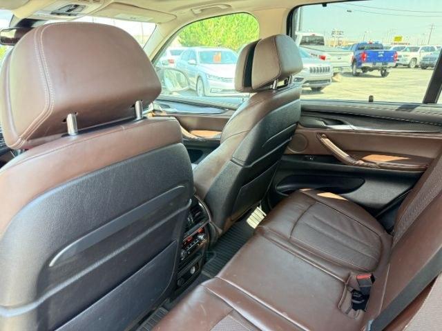 2014 SILVER /Black BMW X5 xDrive35i (5UXKR0C57E0) with an 3L I-6 gasoline direct injection engine, AUTOMATIC transmission, located at 1235 N Woodruff Ave., Idaho Falls, 83401, (208) 523-1053, 43.507172, -112.000488 - This 2014 BMW X5 delivers a smooth turbocharged inline-6 paired with BMW's xDrive AWD system for confident everyday driving and highway comfort. The cabin offers a premium feel with seating for five and flexible cargo space for daily use, travel, or errands. It balances luxury and practicality in a- Photo#54