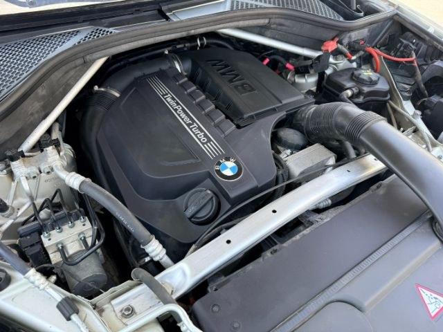 2014 SILVER /Black BMW X5 xDrive35i (5UXKR0C57E0) with an 3L I-6 gasoline direct injection engine, AUTOMATIC transmission, located at 1235 N Woodruff Ave., Idaho Falls, 83401, (208) 523-1053, 43.507172, -112.000488 - This 2014 BMW X5 delivers a smooth turbocharged inline-6 paired with BMW's xDrive AWD system for confident everyday driving and highway comfort. The cabin offers a premium feel with seating for five and flexible cargo space for daily use, travel, or errands. It balances luxury and practicality in a- Photo#55