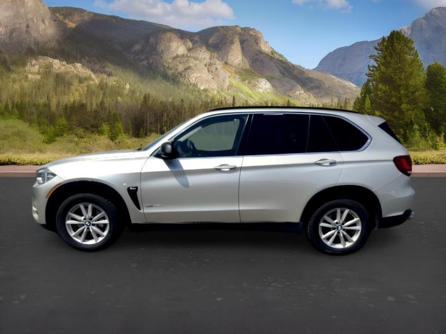 2014 SILVER /Black BMW X5 xDrive35i (5UXKR0C57E0) with an 6 Cyl, 3.0L engine, 8-speed automatic transmission, located at 1175 N Woodruff Ave, Idaho Falls, ID, 83401, 43.506901, -111.999657 - <b>Vehicle Details</b><br>Experience refined performance and premium comfort in this 2014 BMW X5 xDrive35i, now available in Idaho Falls, ID. This luxury SUV pairs BMW's intelligent AWD system with a responsive 6-cylinder, 3.0L gasoline engine, delivering confident acceleration and composed handling- Photo#29