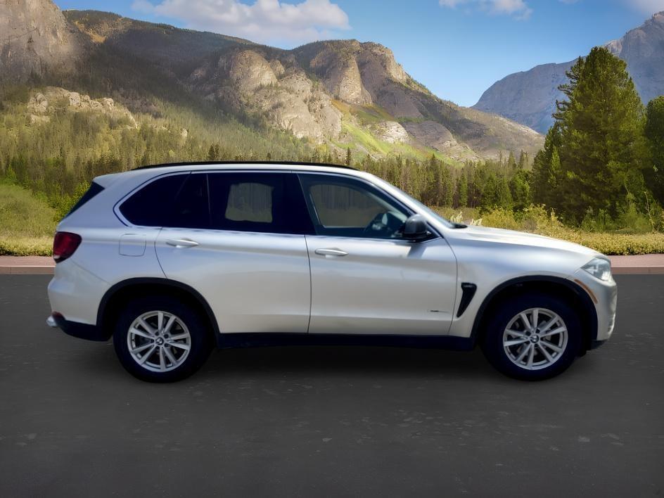 2014 SILVER /Black BMW X5 xDrive35i (5UXKR0C57E0) with an 3L I-6 gasoline direct injection engine, AUTOMATIC transmission, located at 1235 N Woodruff Ave., Idaho Falls, 83401, (208) 523-1053, 43.507172, -112.000488 - This 2014 BMW X5 delivers a smooth turbocharged inline-6 paired with BMW's xDrive AWD system for confident everyday driving and highway comfort. The cabin offers a premium feel with seating for five and flexible cargo space for daily use, travel, or errands. It balances luxury and practicality in a- Photo#8