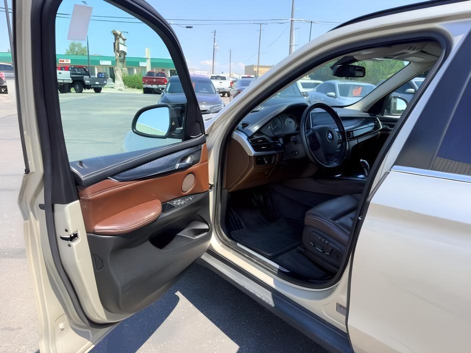 2014 SILVER /Black BMW X5 xDrive35i (5UXKR0C57E0) with an 3L I-6 gasoline direct injection engine, AUTOMATIC transmission, located at 1235 N Woodruff Ave., Idaho Falls, 83401, (208) 523-1053, 43.507172, -112.000488 - This 2014 BMW X5 delivers a smooth turbocharged inline-6 paired with BMW's xDrive AWD system for confident everyday driving and highway comfort. The cabin offers a premium feel with seating for five and flexible cargo space for daily use, travel, or errands. It balances luxury and practicality in a- Photo#13