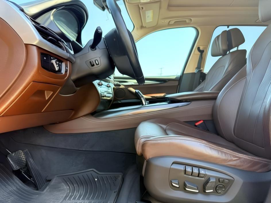 2014 SILVER /Black BMW X5 xDrive35i (5UXKR0C57E0) with an 3L I-6 gasoline direct injection engine, AUTOMATIC transmission, located at 1235 N Woodruff Ave., Idaho Falls, 83401, (208) 523-1053, 43.507172, -112.000488 - This 2014 BMW X5 delivers a smooth turbocharged inline-6 paired with BMW's xDrive AWD system for confident everyday driving and highway comfort. The cabin offers a premium feel with seating for five and flexible cargo space for daily use, travel, or errands. It balances luxury and practicality in a- Photo#14