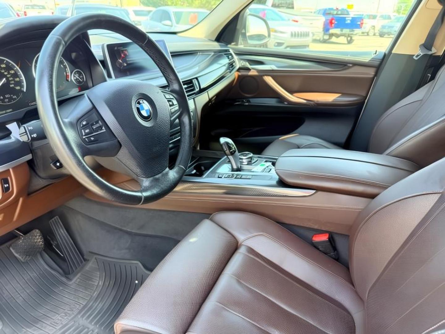 2014 SILVER /Black BMW X5 xDrive35i (5UXKR0C57E0) with an 6 Cyl, 3.0L engine, 8-speed automatic transmission, located at 1175 N Woodruff Ave, Idaho Falls, ID, 83401, 43.506901, -111.999657 - <b>Vehicle Details</b><br>Experience refined performance and premium comfort in this 2014 BMW X5 xDrive35i, now available in Idaho Falls, ID. This luxury SUV pairs BMW's intelligent AWD system with a responsive 6-cylinder, 3.0L gasoline engine, delivering confident acceleration and composed handling- Photo#43