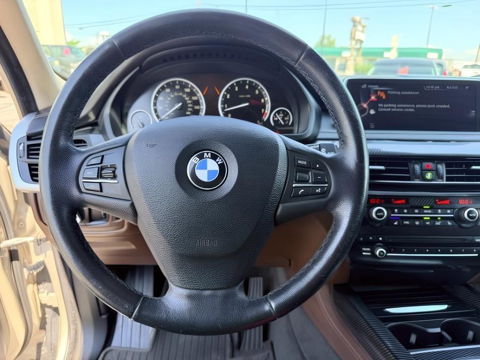 2014 SILVER /Black BMW X5 xDrive35i (5UXKR0C57E0) with an 3L I-6 gasoline direct injection engine, AUTOMATIC transmission, located at 1235 N Woodruff Ave., Idaho Falls, 83401, (208) 523-1053, 43.507172, -112.000488 - This 2014 BMW X5 delivers a smooth turbocharged inline-6 paired with BMW's xDrive AWD system for confident everyday driving and highway comfort. The cabin offers a premium feel with seating for five and flexible cargo space for daily use, travel, or errands. It balances luxury and practicality in a- Photo#16