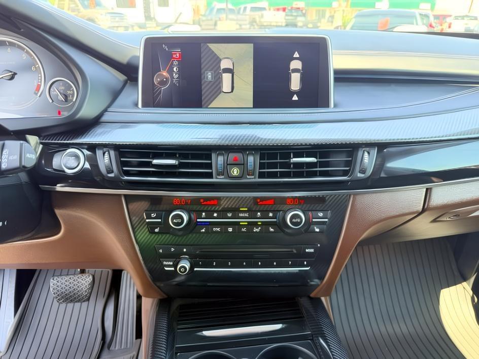 2014 SILVER /Black BMW X5 xDrive35i (5UXKR0C57E0) with an 3L I-6 gasoline direct injection engine, AUTOMATIC transmission, located at 1235 N Woodruff Ave., Idaho Falls, 83401, (208) 523-1053, 43.507172, -112.000488 - This 2014 BMW X5 delivers a smooth turbocharged inline-6 paired with BMW's xDrive AWD system for confident everyday driving and highway comfort. The cabin offers a premium feel with seating for five and flexible cargo space for daily use, travel, or errands. It balances luxury and practicality in a- Photo#17