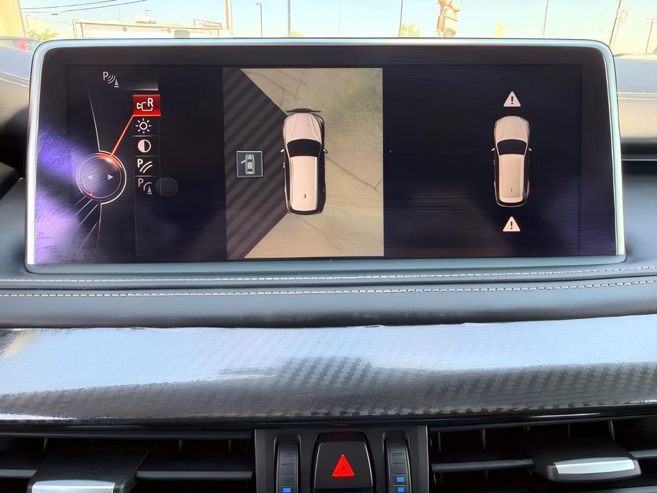 2014 SILVER /Black BMW X5 xDrive35i (5UXKR0C57E0) with an 3L I-6 gasoline direct injection engine, AUTOMATIC transmission, located at 1235 N Woodruff Ave., Idaho Falls, 83401, (208) 523-1053, 43.507172, -112.000488 - This 2014 BMW X5 delivers a smooth turbocharged inline-6 paired with BMW's xDrive AWD system for confident everyday driving and highway comfort. The cabin offers a premium feel with seating for five and flexible cargo space for daily use, travel, or errands. It balances luxury and practicality in a- Photo#18