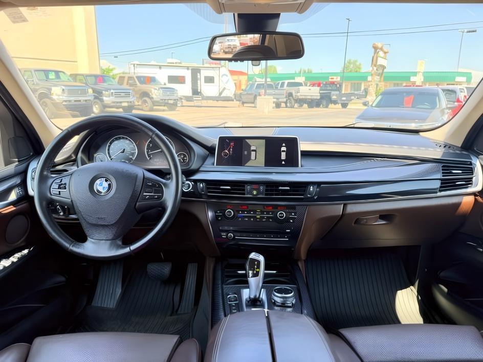 2014 SILVER /Black BMW X5 xDrive35i (5UXKR0C57E0) with an 3L I-6 gasoline direct injection engine, AUTOMATIC transmission, located at 1235 N Woodruff Ave., Idaho Falls, 83401, (208) 523-1053, 43.507172, -112.000488 - This 2014 BMW X5 delivers a smooth turbocharged inline-6 paired with BMW's xDrive AWD system for confident everyday driving and highway comfort. The cabin offers a premium feel with seating for five and flexible cargo space for daily use, travel, or errands. It balances luxury and practicality in a- Photo#24