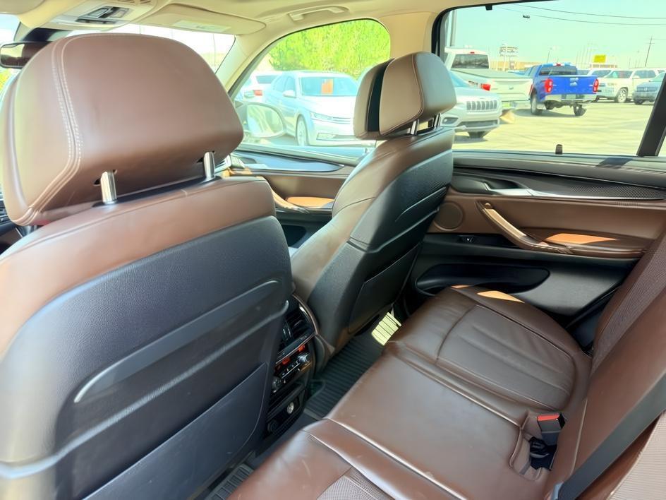 2014 SILVER /Black BMW X5 xDrive35i (5UXKR0C57E0) with an 3L I-6 gasoline direct injection engine, AUTOMATIC transmission, located at 1235 N Woodruff Ave., Idaho Falls, 83401, (208) 523-1053, 43.507172, -112.000488 - This 2014 BMW X5 delivers a smooth turbocharged inline-6 paired with BMW's xDrive AWD system for confident everyday driving and highway comfort. The cabin offers a premium feel with seating for five and flexible cargo space for daily use, travel, or errands. It balances luxury and practicality in a- Photo#26