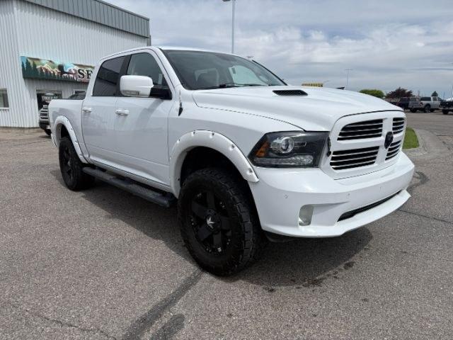 2014 WHITE /Black Ram 1500 (1C6RR7MTXES) with an HEMI 57L V-8 variable valve control engine, Automatic transmission, located at 1175 N Woodruff Ave, Idaho Falls, ID, 83401, 43.506901, -111.999657 - At Timberline Auto, finding a great deal on your next vehicle is always easy! Our experienced sales staff goal is to help find you the right vehicle at the right price! Our knowledgeable finance department has options for almost any credit score. We offer extended service contract options to prot - Photo#37