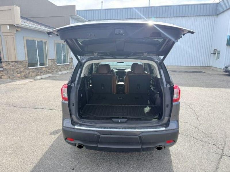 2022 Magnetite Gray Metallic /Java Brown Subaru Ascent Touring (4S4WMARD8N3) with an 4 Cyl, 2.4L engine, 8-speed CVT transmission, located at 1175 N Woodruff Ave, Idaho Falls, ID, 83401, 43.506901, -111.999657 - <b>Vehicle Details</b><br>Looking for a versatile, premium family SUV in Idaho Falls, ID? This pre-owned 2022 Subaru Ascent Touring with AWD is ready to impress with its refined style, confident performance, and spacious three-row comfort. Powered by a 4-cylinder, 2.4L gasoline engine, this Subaru A- Photo#5