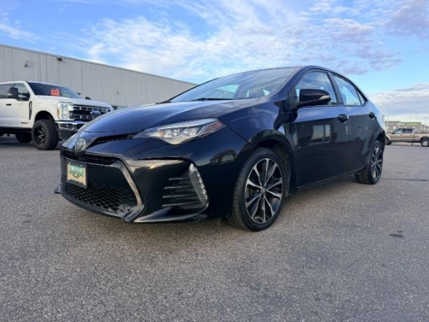 2018 BLACK /Black Toyota Corolla (2T1BURHE4JC) with an 18L I-4 DOHC engine, Automatic transmission, located at 1175 N Woodruff Ave, Idaho Falls, ID, 83401, 43.506901, -111.999657 - Efficiency and everyday reliability define this 2018 Toyota Corolla SE, powered by a 1.8L 4 cylinder engine paired with a CVT transmission and front wheel drive layout. This configuration delivers smooth, predictable driving characteristics that make it a strong fit for commuting, daily errands, and- Photo#0
