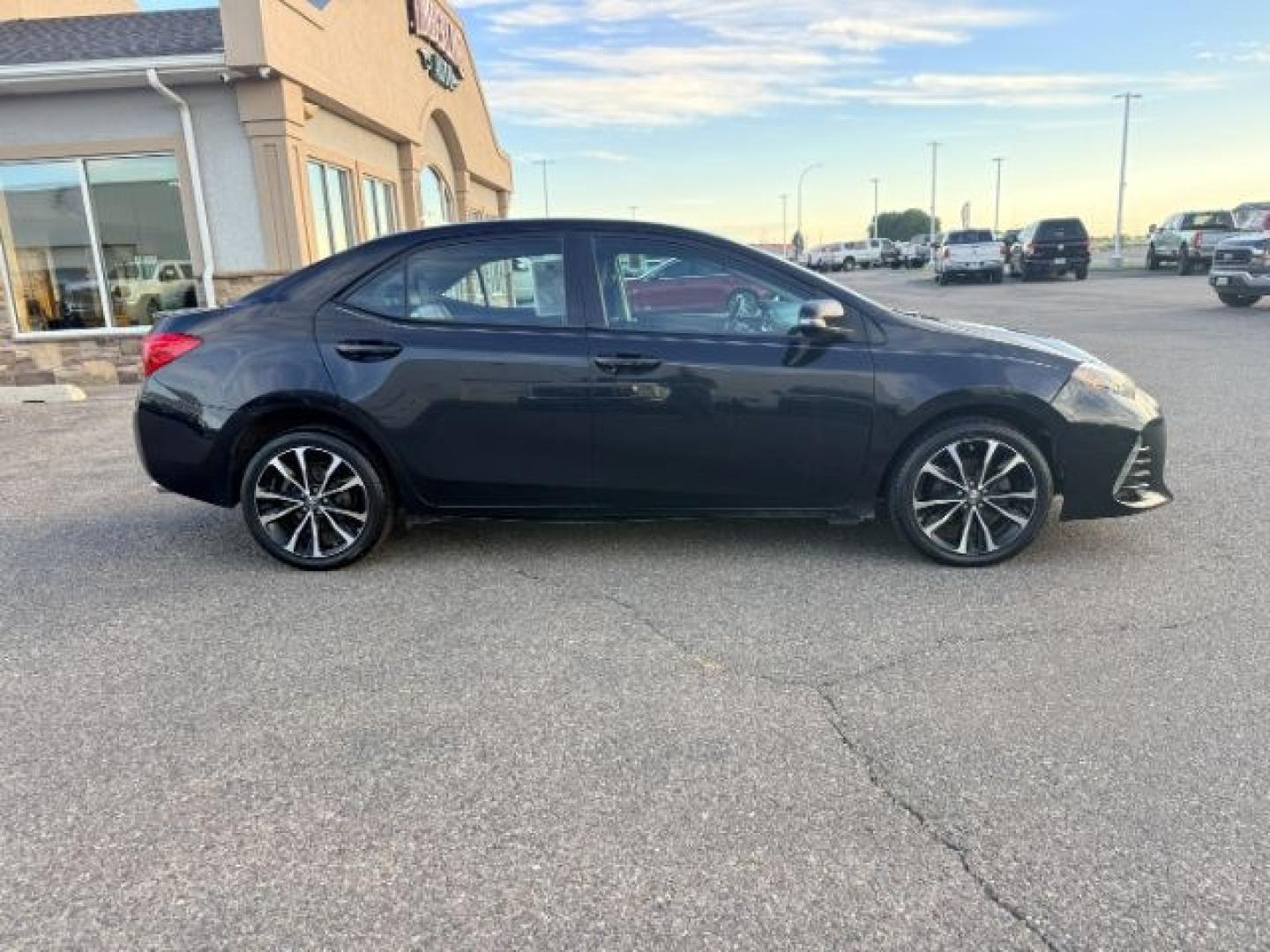 2018 BLACK /Black Toyota Corolla (2T1BURHE4JC) with an 18L I-4 DOHC engine, Automatic transmission, located at 1175 N Woodruff Ave, Idaho Falls, ID, 83401, 43.506901, -111.999657 - Efficiency and everyday reliability define this 2018 Toyota Corolla SE, powered by a 1.8L 4 cylinder engine paired with a CVT transmission and front wheel drive layout. This configuration delivers smooth, predictable driving characteristics that make it a strong fit for commuting, daily errands, and- Photo#6