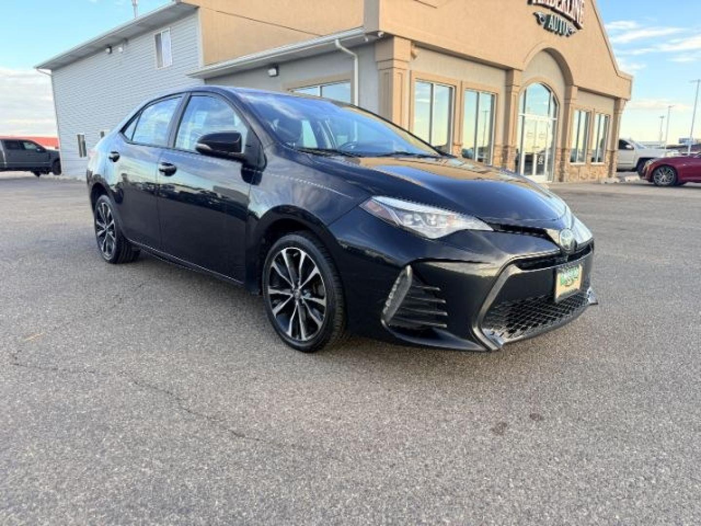 2018 BLACK /Black Toyota Corolla (2T1BURHE4JC) with an 18L I-4 DOHC engine, Automatic transmission, located at 1175 N Woodruff Ave, Idaho Falls, ID, 83401, 43.506901, -111.999657 - Efficiency and everyday reliability define this 2018 Toyota Corolla SE, powered by a 1.8L 4 cylinder engine paired with a CVT transmission and front wheel drive layout. This configuration delivers smooth, predictable driving characteristics that make it a strong fit for commuting, daily errands, and- Photo#7