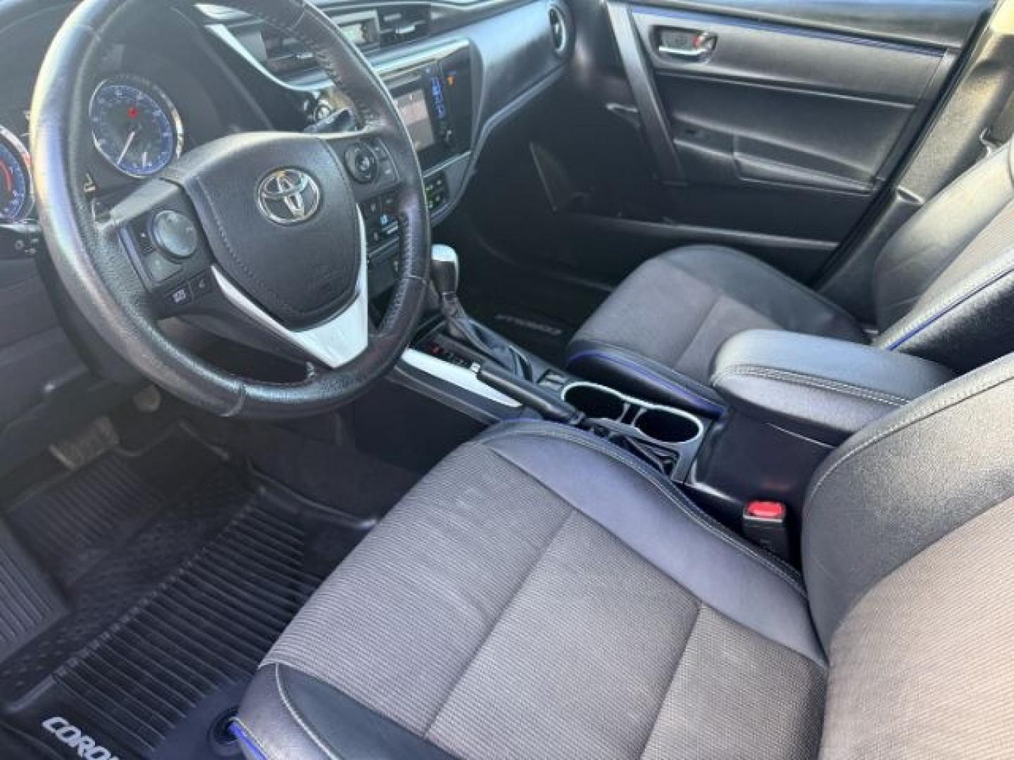 2018 BLACK /Black Toyota Corolla (2T1BURHE4JC) with an 18L I-4 DOHC engine, Automatic transmission, located at 1175 N Woodruff Ave, Idaho Falls, ID, 83401, 43.506901, -111.999657 - Efficiency and everyday reliability define this 2018 Toyota Corolla SE, powered by a 1.8L 4 cylinder engine paired with a CVT transmission and front wheel drive layout. This configuration delivers smooth, predictable driving characteristics that make it a strong fit for commuting, daily errands, and- Photo#13
