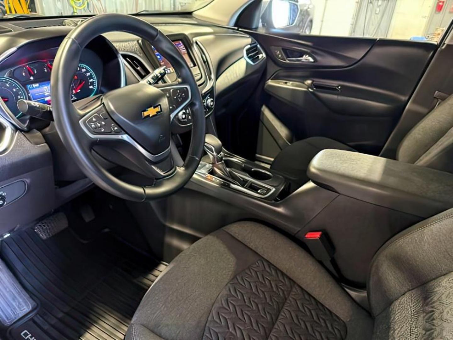 2023 GRAY /CLOTH Chevrolet Equinox LT (3GNAXUEG0PS) with an 1.5L I4 TURBO engine, AUTOMATIC transmission, located at 1235 N Woodruff Ave., Idaho Falls, 83401, (208) 523-1053, 43.507172, -112.000488 - At Timberline Auto, finding a great deal on your next vehicle is always easy! Our experienced sales staff goal is to help find you the right vehicle at the right price! Our knowledgeable finance department has options for almost any credit score. We offer extended service contract options to prot - Photo#16