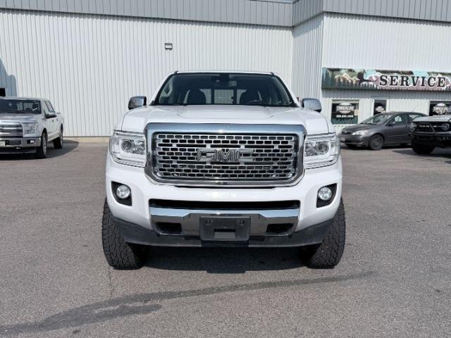 2017 WHITE /Jet Black GMC Canyon (1GTP6DE17H1) with an Duramax 28L I-4 diesel direct injection engine, Automatic transmission, located at 1175 N Woodruff Ave, Idaho Falls, ID, 83401, 43.506901, -111.999657 - Power meets efficiency with this 2017 GMC Canyon equipped with the proven 2.8L Duramax turbo-diesel engine and dependable 4WD system. Its Extended Cab configuration provides extra interior space while maintaining the maneuverability that makes a midsize pickup easy to drive every day. Whether you're- Photo#34