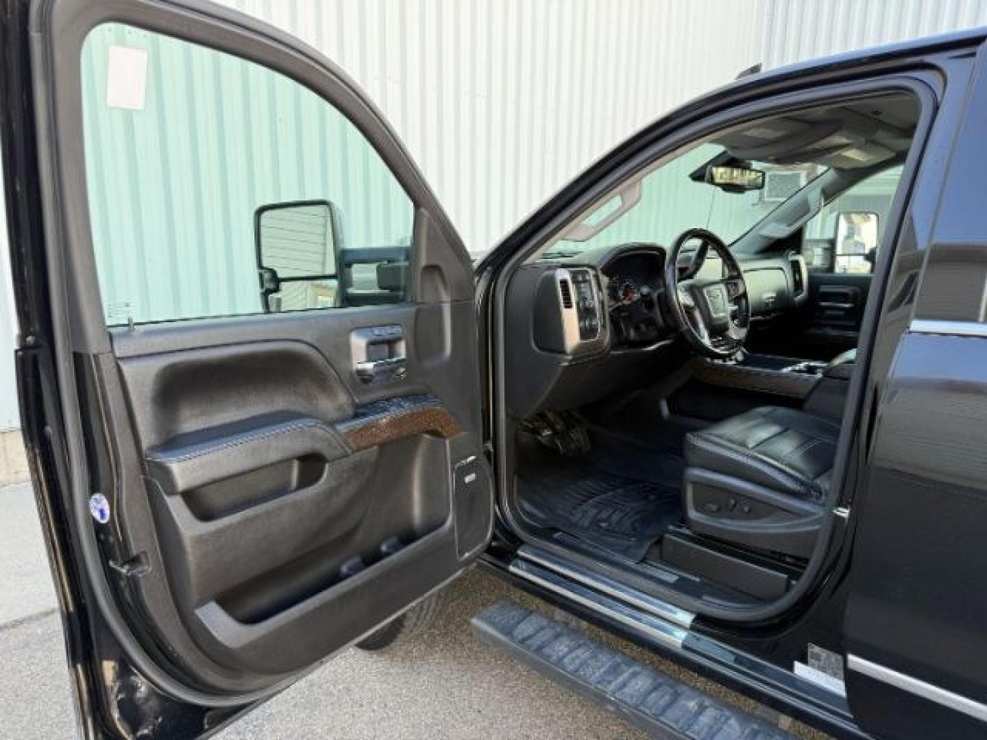 2018 BLACK /Jet Black GMC Sierra 2500HD Denali (1GT12UEY3JF) with an Duramax 6.6L V-8 diesel direct injection engine, AUTOMATIC transmission, located at 1235 N Woodruff Ave., Idaho Falls, 83401, (208) 523-1053, 43.507172, -112.000488 - At Timberline Auto, finding a great deal on your next vehicle is always easy! Our experienced sales staff goal is to help find you the right vehicle at the right price! Our knowledgeable finance department has options for almost any credit score. We offer extended service contract options to prot - Photo#40