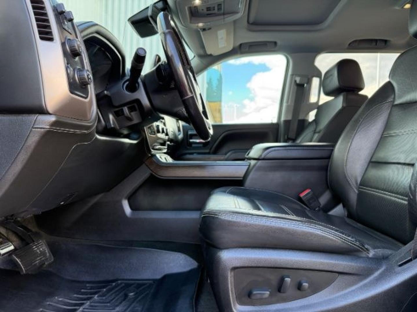 2018 BLACK /Jet Black GMC Sierra 2500HD Denali (1GT12UEY3JF) with an Duramax 6.6L V-8 diesel direct injection engine, AUTOMATIC transmission, located at 1235 N Woodruff Ave., Idaho Falls, 83401, (208) 523-1053, 43.507172, -112.000488 - At Timberline Auto, finding a great deal on your next vehicle is always easy! Our experienced sales staff goal is to help find you the right vehicle at the right price! Our knowledgeable finance department has options for almost any credit score. We offer extended service contract options to prot - Photo#41