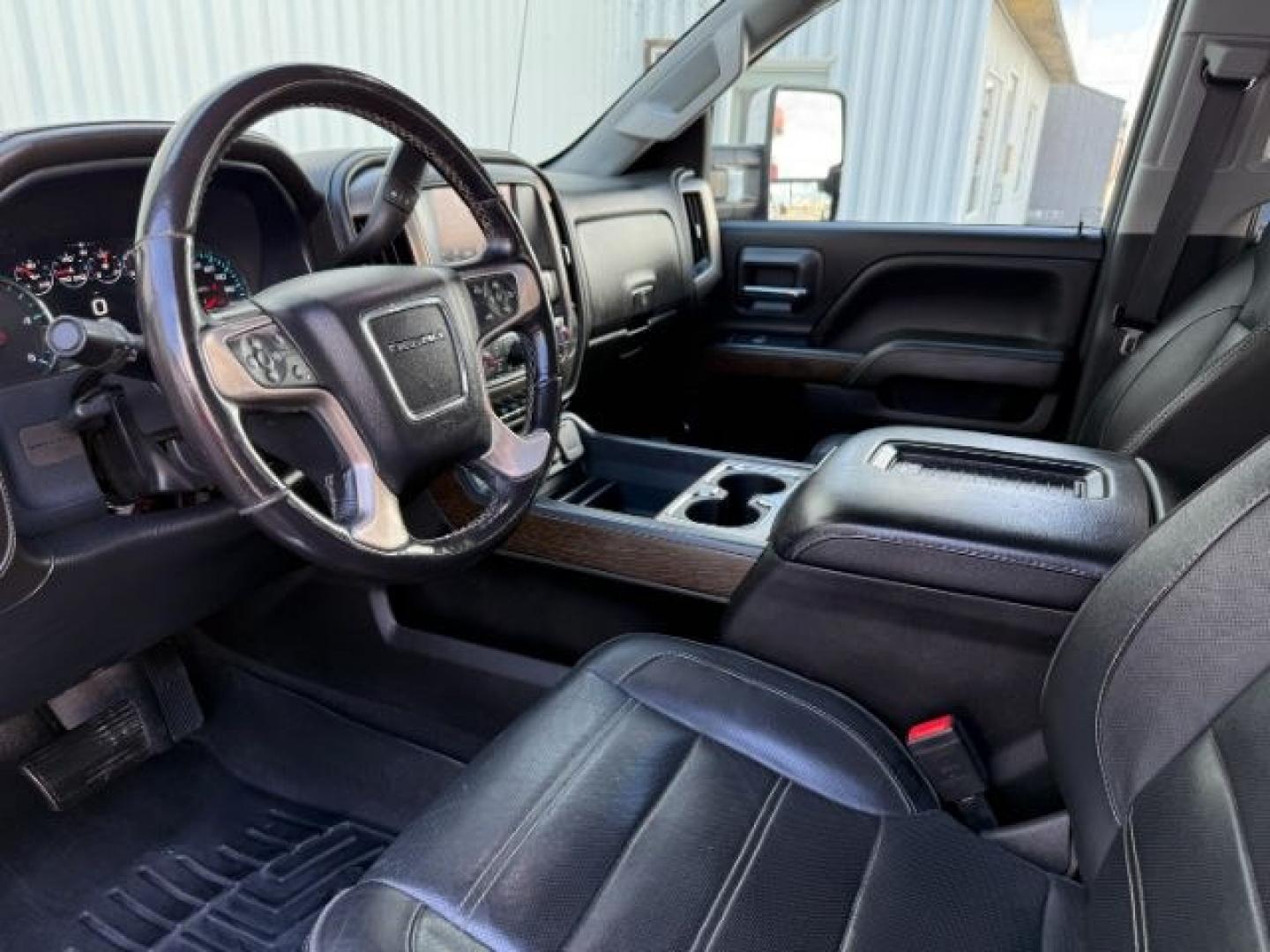 2018 BLACK /Jet Black GMC Sierra 2500HD Denali (1GT12UEY3JF) with an Duramax 6.6L V-8 diesel direct injection engine, AUTOMATIC transmission, located at 1235 N Woodruff Ave., Idaho Falls, 83401, (208) 523-1053, 43.507172, -112.000488 - At Timberline Auto, finding a great deal on your next vehicle is always easy! Our experienced sales staff goal is to help find you the right vehicle at the right price! Our knowledgeable finance department has options for almost any credit score. We offer extended service contract options to prot - Photo#42