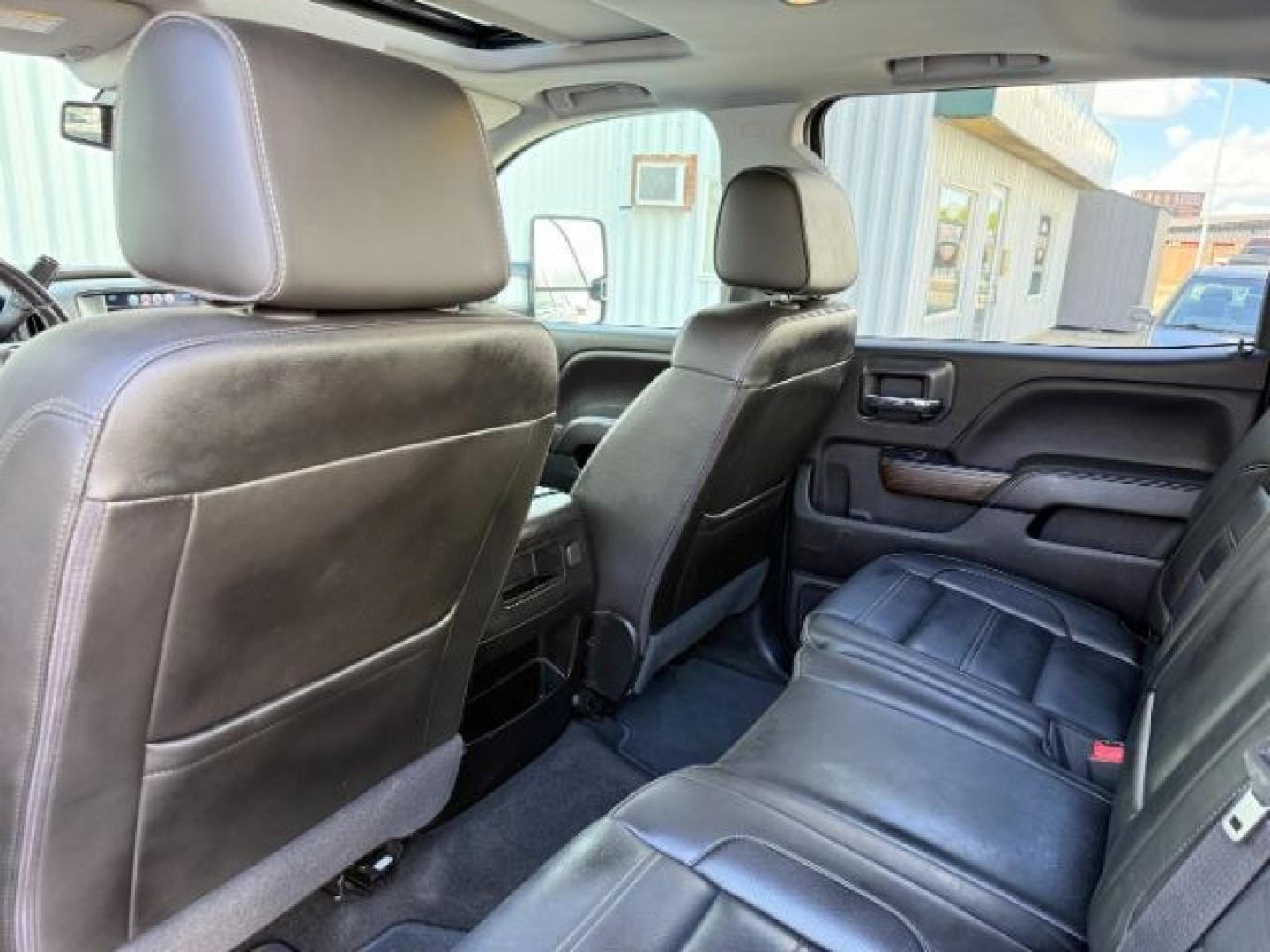 2018 BLACK /Jet Black GMC Sierra 2500HD Denali (1GT12UEY3JF) with an Duramax 6.6L V-8 diesel direct injection engine, AUTOMATIC transmission, located at 1235 N Woodruff Ave., Idaho Falls, 83401, (208) 523-1053, 43.507172, -112.000488 - At Timberline Auto, finding a great deal on your next vehicle is always easy! Our experienced sales staff goal is to help find you the right vehicle at the right price! Our knowledgeable finance department has options for almost any credit score. We offer extended service contract options to prot - Photo#56