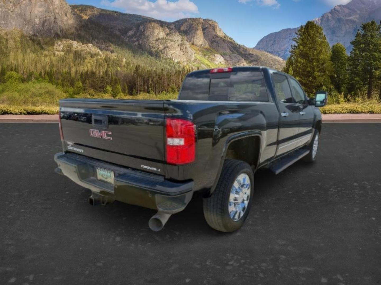 2018 BLACK /Jet Black GMC Sierra 2500HD Denali (1GT12UEY3JF) with an Duramax 6.6L V-8 diesel direct injection engine, AUTOMATIC transmission, located at 1235 N Woodruff Ave., Idaho Falls, 83401, (208) 523-1053, 43.507172, -112.000488 - At Timberline Auto, finding a great deal on your next vehicle is always easy! Our experienced sales staff goal is to help find you the right vehicle at the right price! Our knowledgeable finance department has options for almost any credit score. We offer extended service contract options to prot - Photo#6