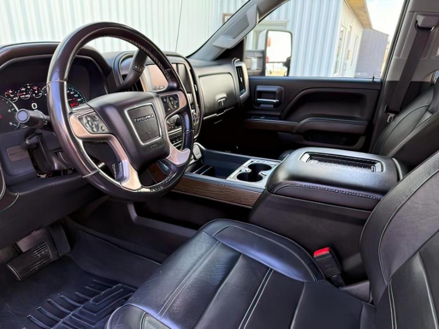 2018 BLACK /Jet Black GMC Sierra 2500HD Denali (1GT12UEY3JF) with an Duramax 6.6L V-8 diesel direct injection engine, AUTOMATIC transmission, located at 1235 N Woodruff Ave., Idaho Falls, 83401, (208) 523-1053, 43.507172, -112.000488 - At Timberline Auto, finding a great deal on your next vehicle is always easy! Our experienced sales staff goal is to help find you the right vehicle at the right price! Our knowledgeable finance department has options for almost any credit score. We offer extended service contract options to prot - Photo#13