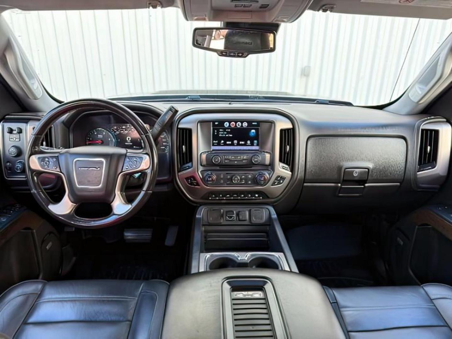 2018 BLACK /Jet Black GMC Sierra 2500HD Denali (1GT12UEY3JF) with an Duramax 6.6L V-8 diesel direct injection engine, AUTOMATIC transmission, located at 1235 N Woodruff Ave., Idaho Falls, 83401, (208) 523-1053, 43.507172, -112.000488 - At Timberline Auto, finding a great deal on your next vehicle is always easy! Our experienced sales staff goal is to help find you the right vehicle at the right price! Our knowledgeable finance department has options for almost any credit score. We offer extended service contract options to prot - Photo#26