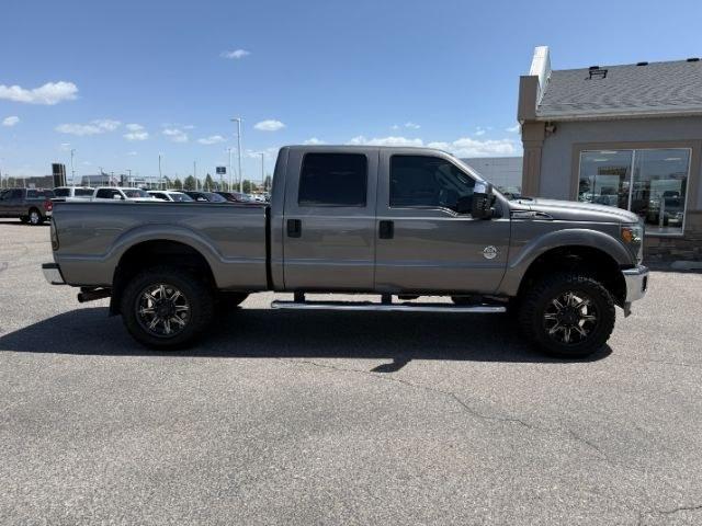 2013 GRAY /BLACK Ford F-350 (1FT8W3BTXDE) with an Powerstroke 67L V-8 diesel direct injection engine, Automatic transmission, located at 1175 N Woodruff Ave, Idaho Falls, ID, 83401, 43.506901, -111.999657 - Heavy duty strength and serious truck utility come together in this 2013 Ford F-350 Super Duty Crew Cab equipped with a 6.7L Power Stroke turbo diesel engine and four wheel drive capability. Diesel power and Super Duty engineering make this truck a strong fit for towing trailers, hauling equipment,- Photo#31