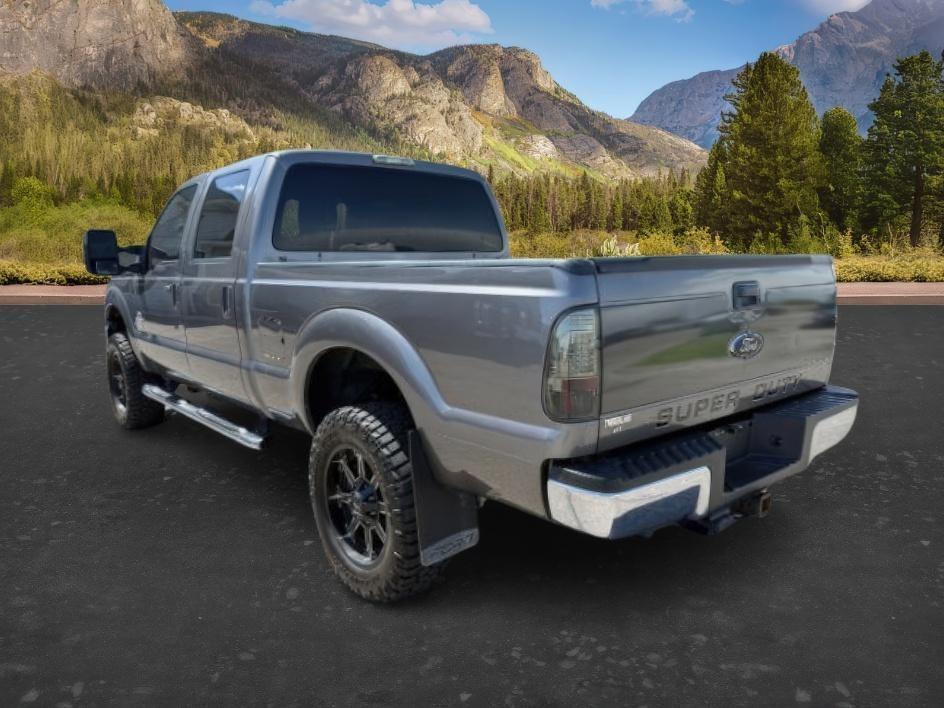 2013 GRAY /BLACK Ford F-350 (1FT8W3BTXDE) with an Powerstroke 67L V-8 diesel direct injection engine, Automatic transmission, located at 1175 N Woodruff Ave, Idaho Falls, ID, 83401, 43.506901, -111.999657 - Heavy duty strength and serious truck utility come together in this 2013 Ford F-350 Super Duty Crew Cab equipped with a 6.7L Power Stroke turbo diesel engine and four wheel drive capability. Diesel power and Super Duty engineering make this truck a strong fit for towing trailers, hauling equipment,- Photo#2