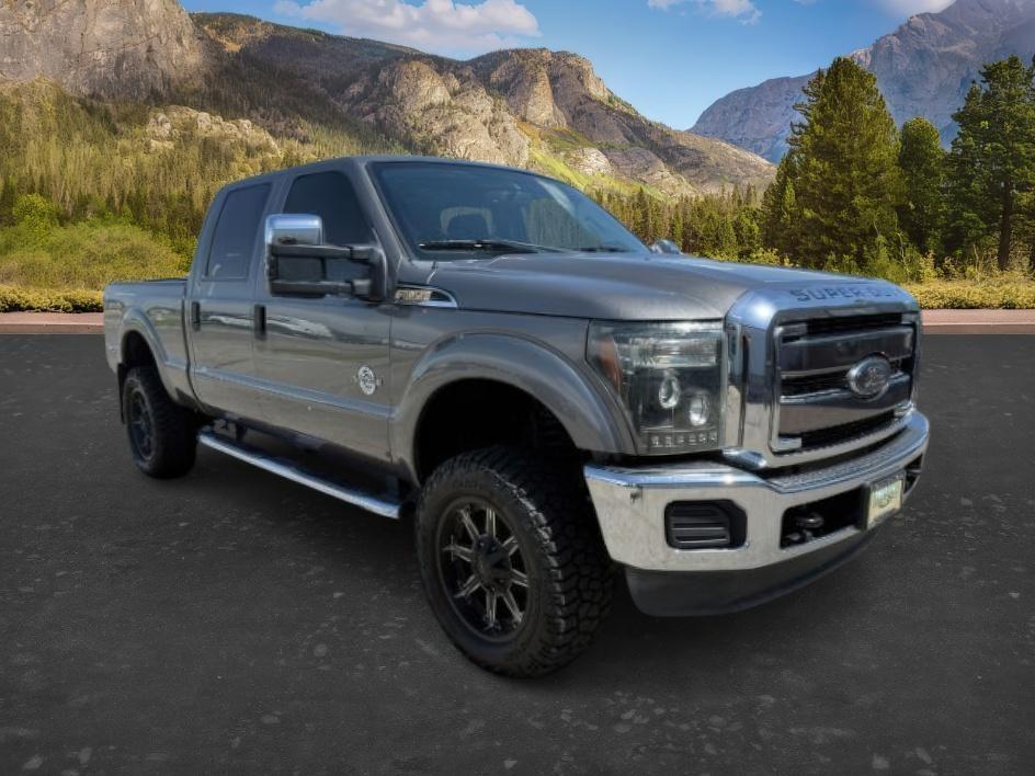 2013 GRAY /BLACK Ford F-350 (1FT8W3BTXDE) with an Powerstroke 67L V-8 diesel direct injection engine, Automatic transmission, located at 1175 N Woodruff Ave, Idaho Falls, ID, 83401, 43.506901, -111.999657 - Heavy duty strength and serious truck utility come together in this 2013 Ford F-350 Super Duty Crew Cab equipped with a 6.7L Power Stroke turbo diesel engine and four wheel drive capability. Diesel power and Super Duty engineering make this truck a strong fit for towing trailers, hauling equipment,- Photo#7