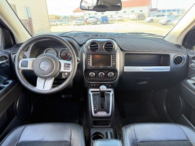 2015 GRAY /Dark Slate Gray Jeep Compass Latitude (1C4NJDEB3FD) with an 2.4L I-4 DOHC engine, AUTOMATIC transmission, located at 1235 N Woodruff Ave., Idaho Falls, 83401, (208) 523-1053, 43.507172, -112.000488 - At Timberline Auto, finding a great deal on your next vehicle is always easy! Our experienced sales staff goal is to help find you the right vehicle at the right price! Our knowledgeable finance department has options for almost any credit score. We offer extended service contract options to prot - Photo#49