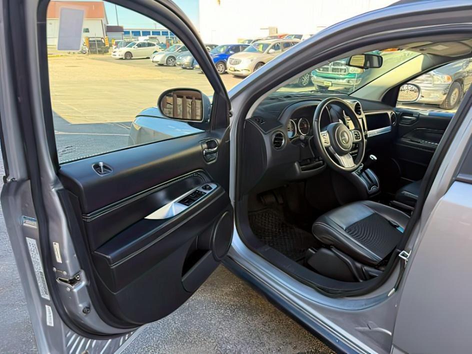 2015 GRAY /Dark Slate Gray Jeep Compass Latitude (1C4NJDEB3FD) with an 2.4L I-4 DOHC engine, AUTOMATIC transmission, located at 1235 N Woodruff Ave., Idaho Falls, 83401, (208) 523-1053, 43.507172, -112.000488 - At Timberline Auto, finding a great deal on your next vehicle is always easy! Our experienced sales staff goal is to help find you the right vehicle at the right price! Our knowledgeable finance department has options for almost any credit score. We offer extended service contract options to prot - Photo#13