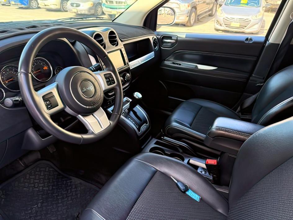 2015 GRAY /Dark Slate Gray Jeep Compass Latitude (1C4NJDEB3FD) with an 2.4L I-4 DOHC engine, AUTOMATIC transmission, located at 1235 N Woodruff Ave., Idaho Falls, 83401, (208) 523-1053, 43.507172, -112.000488 - At Timberline Auto, finding a great deal on your next vehicle is always easy! Our experienced sales staff goal is to help find you the right vehicle at the right price! Our knowledgeable finance department has options for almost any credit score. We offer extended service contract options to prot - Photo#15