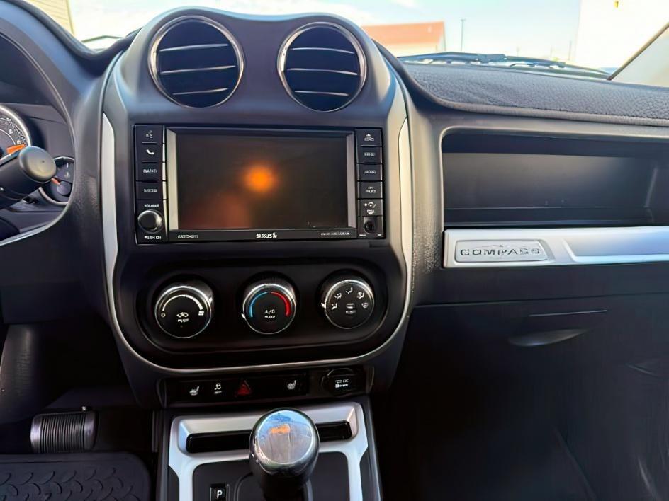 2015 GRAY /Dark Slate Gray Jeep Compass Latitude (1C4NJDEB3FD) with an 2.4L I-4 DOHC engine, AUTOMATIC transmission, located at 1235 N Woodruff Ave., Idaho Falls, 83401, (208) 523-1053, 43.507172, -112.000488 - At Timberline Auto, finding a great deal on your next vehicle is always easy! Our experienced sales staff goal is to help find you the right vehicle at the right price! Our knowledgeable finance department has options for almost any credit score. We offer extended service contract options to prot - Photo#17