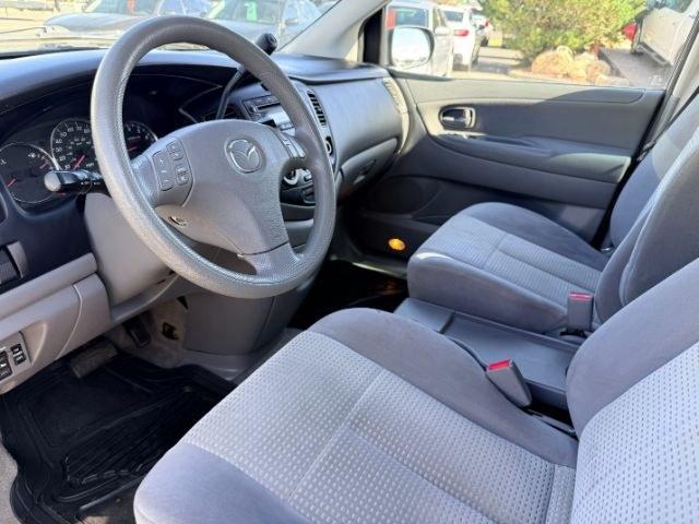 2005 SILVER /Gray Mazda MPV LX (JM3LW28J750) with an 3L V-6 DOHC engine, AUTOMATIC transmission, located at 1235 N Woodruff Ave., Idaho Falls, 83401, (208) 523-1053, 43.507172, -112.000488 - Practical passenger space and everyday versatility come together in this 2005 Mazda MPV, offering a straightforward 3 row minivan setup with seating for family, friends, or extra cargo flexibility when needed. Powered by a 3.0L V6 engine, it delivers smooth, simple performance suited for commuting,- Photo#13