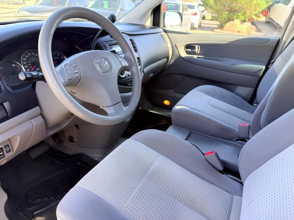 2005 SILVER /Gray Mazda MPV (JM3LW28J750) with an 3L V-6 DOHC engine, Automatic transmission, located at 1175 N Woodruff Ave, Idaho Falls, ID, 83401, 43.506901, -111.999657 - Practical passenger space and everyday versatility come together in this 2005 Mazda MPV, offering a straightforward 3 row minivan setup with seating for family, friends, or extra cargo flexibility when needed. Powered by a 3.0L V6 engine, it delivers smooth, simple performance suited for commuting,- Photo#12