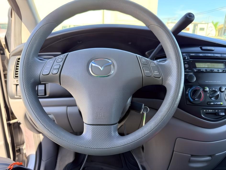2005 SILVER /Gray Mazda MPV (JM3LW28J750) with an 3L V-6 DOHC engine, Automatic transmission, located at 1175 N Woodruff Ave, Idaho Falls, ID, 83401, 43.506901, -111.999657 - Practical passenger space and everyday versatility come together in this 2005 Mazda MPV, offering a straightforward 3 row minivan setup with seating for family, friends, or extra cargo flexibility when needed. Powered by a 3.0L V6 engine, it delivers smooth, simple performance suited for commuting,- Photo#13