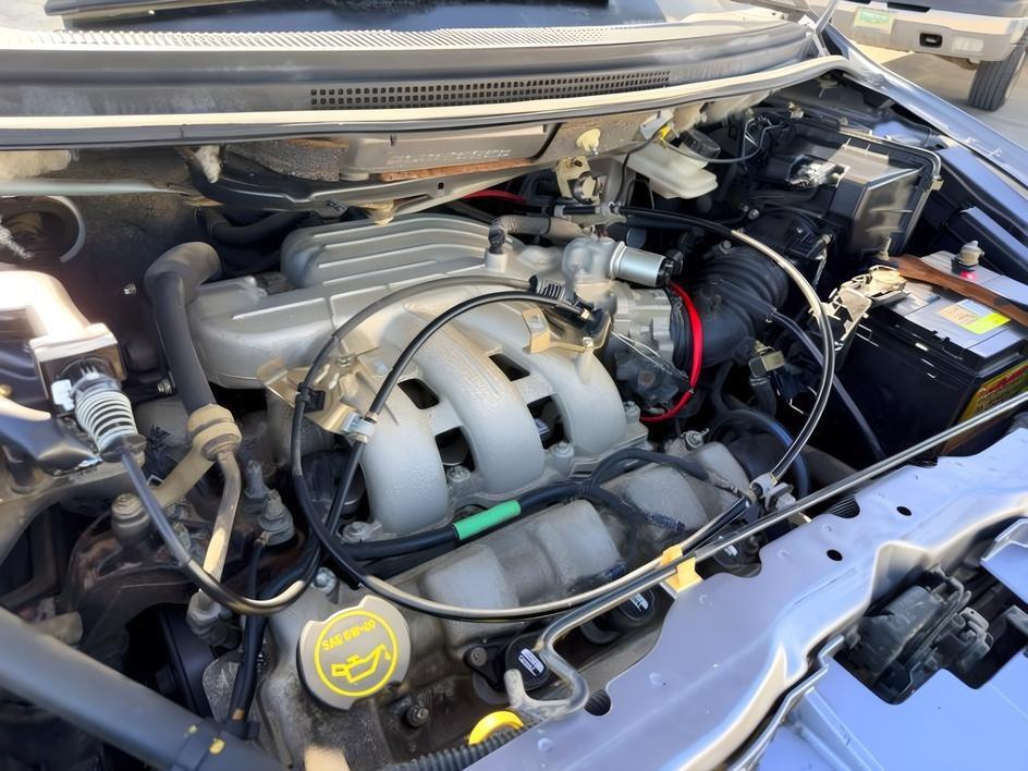 2005 SILVER /Gray Mazda MPV (JM3LW28J750) with an 3L V-6 DOHC engine, Automatic transmission, located at 1175 N Woodruff Ave, Idaho Falls, ID, 83401, 43.506901, -111.999657 - Practical passenger space and everyday versatility come together in this 2005 Mazda MPV, offering a straightforward 3 row minivan setup with seating for family, friends, or extra cargo flexibility when needed. Powered by a 3.0L V6 engine, it delivers smooth, simple performance suited for commuting,- Photo#22