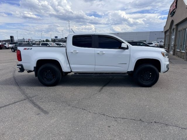 2019 WHITE /LEATHER Chevrolet Colorado (1GCGTDEN9K1) with an 36 V6 engine, Automatic transmission, located at 1175 N Woodruff Ave, Idaho Falls, ID, 83401, 43.506901, -111.999657 - Midsize truck utility and everyday versatility come together in this 2019 Chevrolet Colorado Z71 4x4, equipped with a 3.6L V6 engine and off road focused Z71 setup. Four wheel drive capability adds confidence on changing road conditions while maintaining the manageable size drivers want for daily co- Photo#35