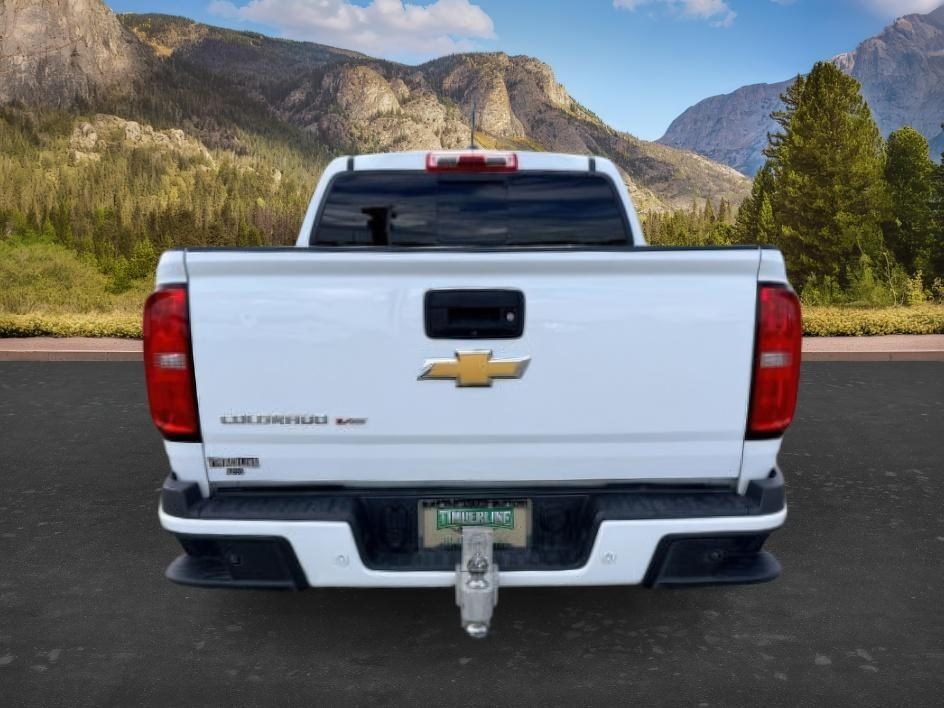 2019 WHITE /LEATHER Chevrolet Colorado (1GCGTDEN9K1) with an 36 V6 engine, Automatic transmission, located at 1175 N Woodruff Ave, Idaho Falls, ID, 83401, 43.506901, -111.999657 - Midsize truck utility and everyday versatility come together in this 2019 Chevrolet Colorado Z71 4x4, equipped with a 3.6L V6 engine and off road focused Z71 setup. Four wheel drive capability adds confidence on changing road conditions while maintaining the manageable size drivers want for daily co- Photo#3